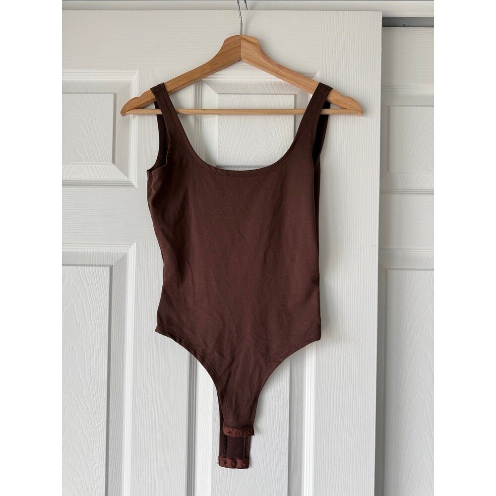brown low back bodysuit